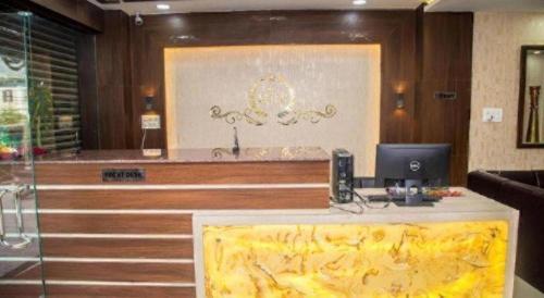 a office with a desk with a computer on it at Hotel Gajur Palace in Itahari