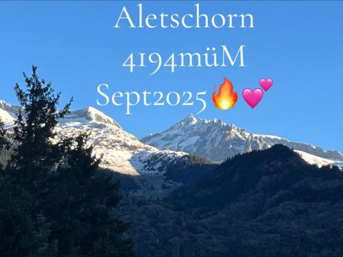 a picture of a mountain with two hearts in the sky at Historische Maisonettewohnung bis 10 Gäste, Magic Pass Belalp, Rosswald und mehr in Naters