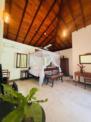 Postel nebo postele na pokoji v ubytování Lotus and Moon