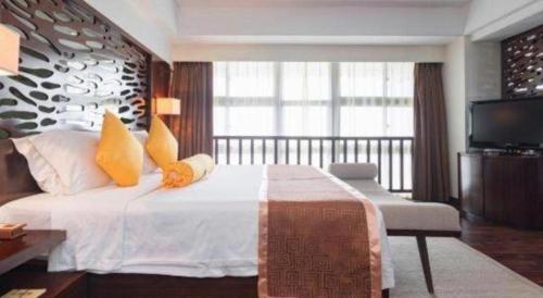 Postel nebo postele na pokoji v ubytování Man Wan Harmona Resort