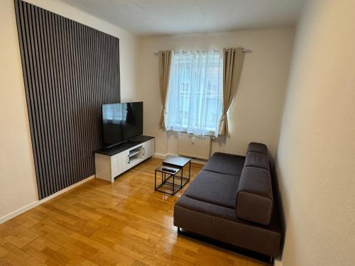 TV a/nebo společenská místnost v ubytování Apartment SNOW