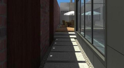 a hallway of a building with the shadows of windows at NH Shijiazhuang Financial Center in Shijiazhuang