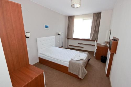 Llit o llits en una habitació de Kolhida Complex