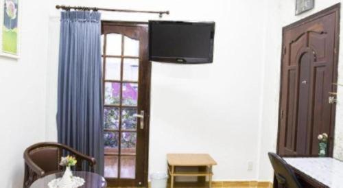Телевизор и/или развлекательный центр в Spring Hotel