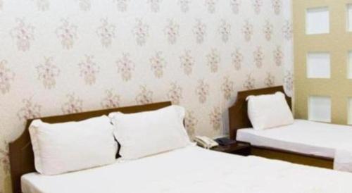 Кровать или кровати в номере Spring Hotel