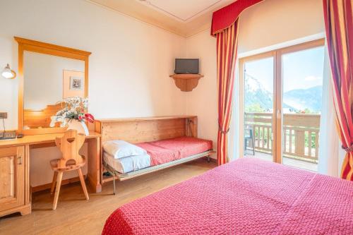 Postel nebo postele na pokoji v ubytování Hotel Fai