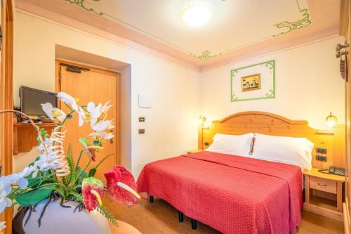 Postel nebo postele na pokoji v ubytování Hotel Fai