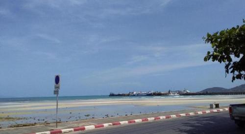 a view of a beach with the ocean at Jinta Hotel Nathon Beach in Chaweng