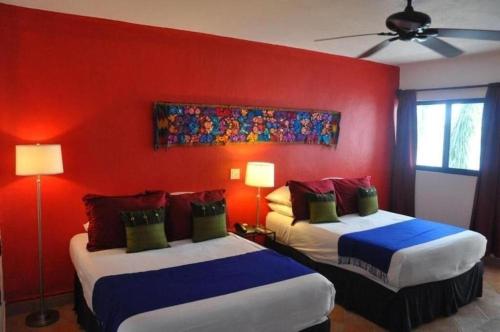 Letto o letti in una camera di Flamingo Hotel