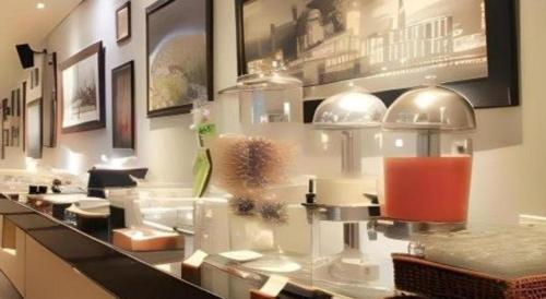 a store counter with a lot of items on it at Pomelotel Patra Kuningan Jakarta in Jakarta