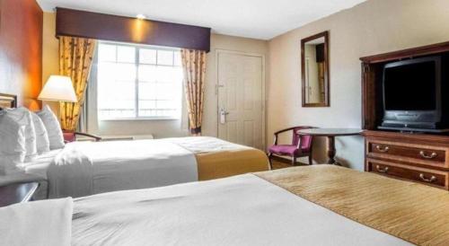 Katil atau katil-katil dalam bilik di Quality Inn & Suites Minden