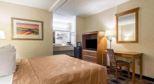 Postel nebo postele na pokoji v ubytování Quality Inn