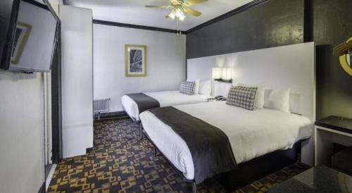 Кровать или кровати в номере Adante Hotel, a C-Two Hotel