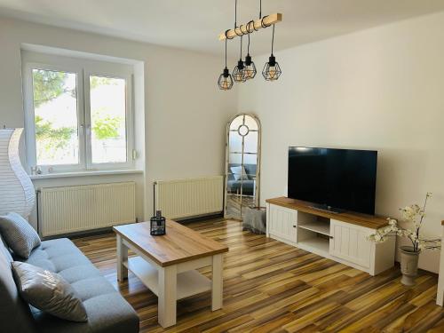 Un televizor și/sau centru de divertisment la Guesthouse Tulln
