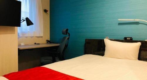 Кровать или кровати в номере Hotel Bougainvillea Akebonobashi