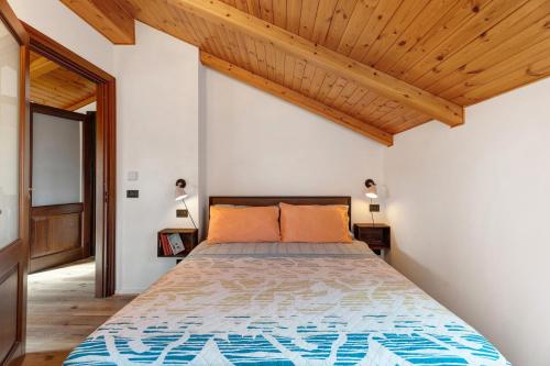 Postel nebo postele na pokoji v ubytování Casa Verde - Grignasco