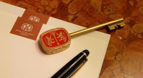 a pen sitting on top of a piece of paper at Hotel de Premiere Minowa in Inawashiro