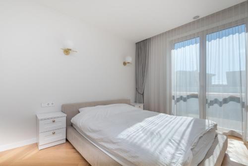 Katil atau katil-katil dalam bilik di The Zen Den Apartment in Uzupis