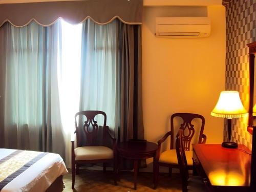 Кровать или кровати в номере MB Hotel
