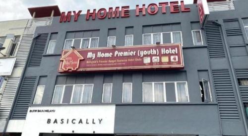a building with a sign on the side of it at My Home Hotel Wangsa Maju in Kuala Lumpur