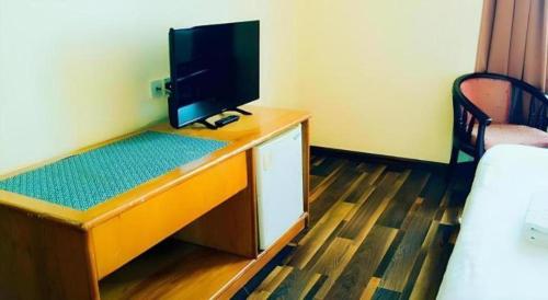 TV a/nebo společenská místnost v ubytování Global Hotel Labuan