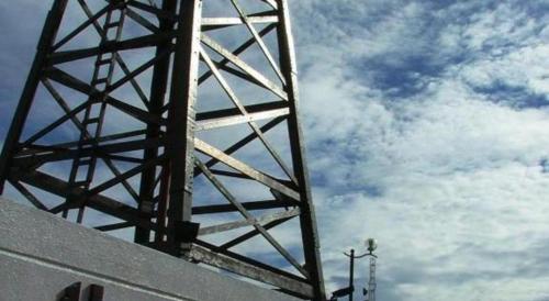 a bridge with the sky in the background at Hotel O 98inn in Miri