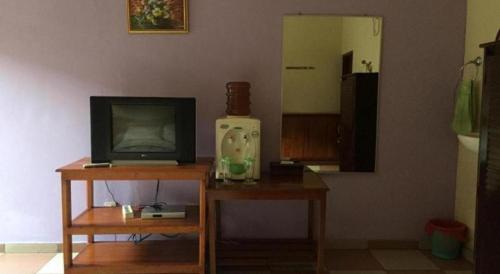 Телевизор и/или развлекательный центр в Hotel Bunga Pantai