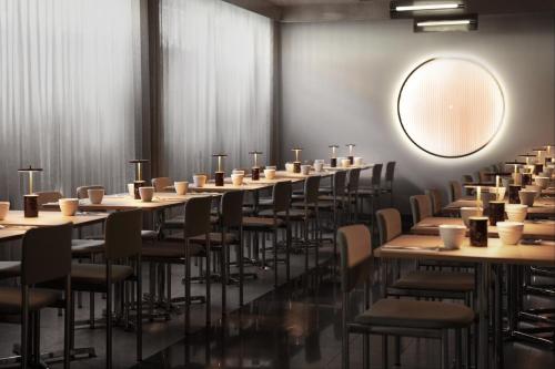 Un restaurante o sitio para comer en Hotel Hans