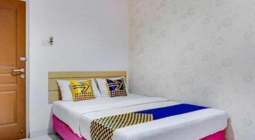 Cama o camas de una habitación en Wisma Jampea