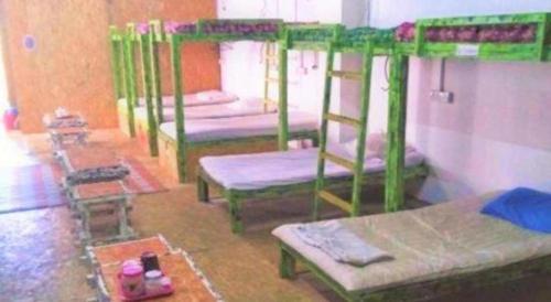 a group of bunk beds in a room at Hijrah Hotel, Alor Setar in Alor Setar