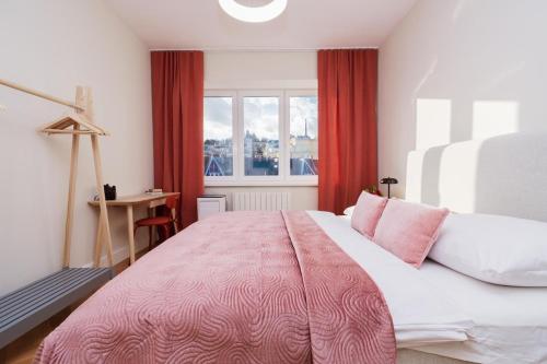 Ένα ή περισσότερα κρεβάτια σε δωμάτιο στο Charming train lines studio