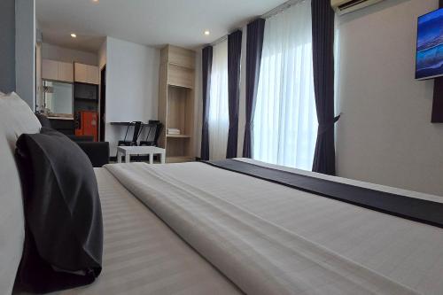 Le Nara Residenceにあるベッド