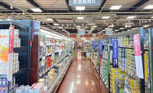 a store aisle of a grocery store filled with goods at The SAKAI newly built home 7 mins walk from Train Station in Abiko