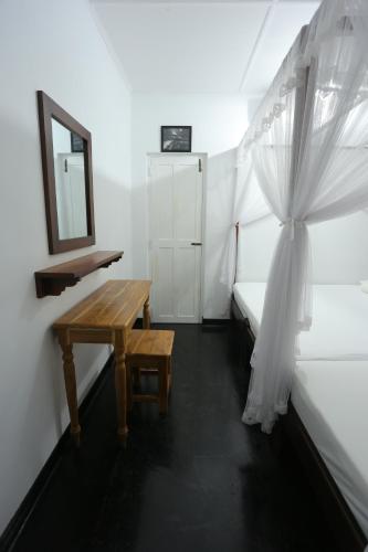 Postel nebo postele na pokoji v ubytování City Tourist Rest