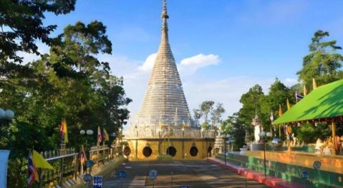 a temple with two towers in a park at INBED in Sadao