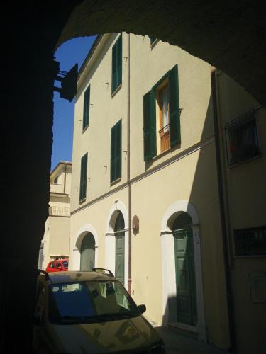 a car parked in front of a building at Arco di San Francesco in Atri