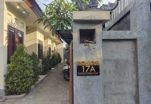 a pizza oven on the side of a building at Mandala Living in Ketewel
