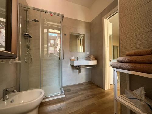 a bathroom with a shower and a sink at Dimora in Fiore B&B in Foggia