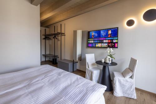 Postel nebo postele na pokoji v ubytování Casa Fontana, Luxury Rooms and Suite