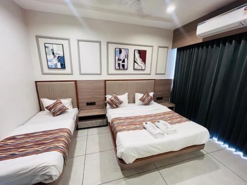 Katil atau katil-katil dalam bilik di Hotel Acme Sky