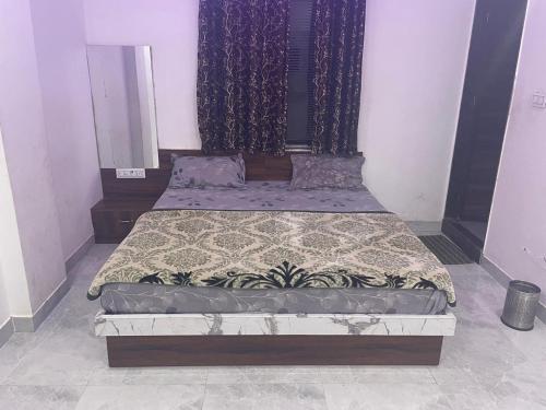 a bed sitting in a room with at Lakshika Palace in Khātu