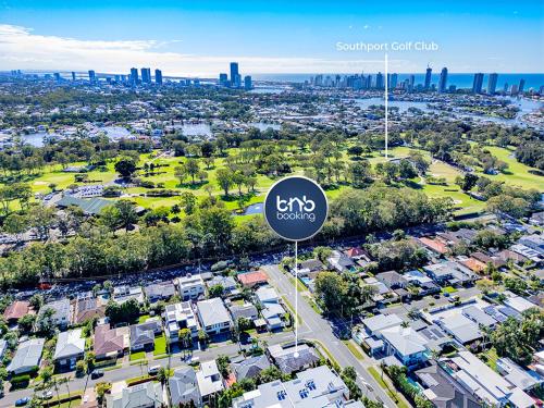 an overhead view of a city with a sign in the foreground at The Chill House - Heated Pool - Entertainment Area in Gold Coast
