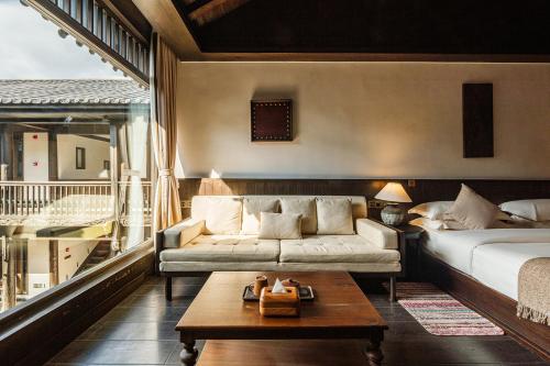 Un lugar para sentarse en Floral Sheqinghe B&B