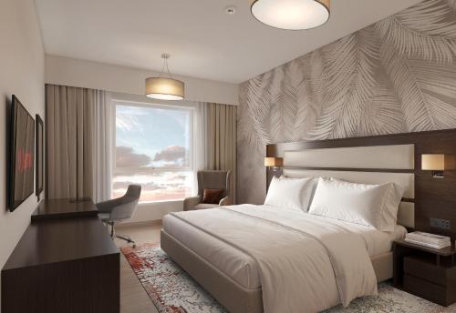 Vintage Grand Hotel - Formerly Ghaya Grand Hotelにあるベッド