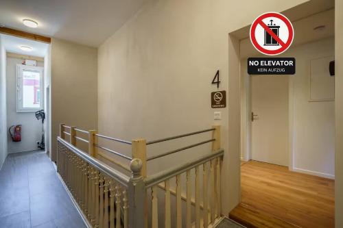 a no elevator sign on the side of a building at Heart of Interlaken Apartments in Interlaken
