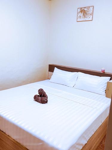 ANK Residence Patongにあるベッド