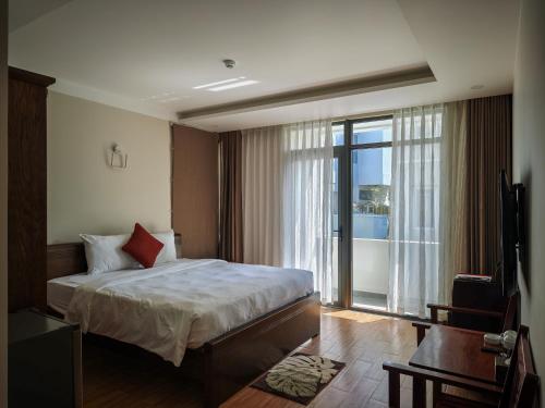 Кровать или кровати в номере Sealight Villa and House Phu Quoc