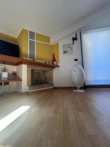 a living room with a large projection screen in a room at La La Home in Avezzano