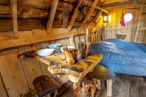 Ένα ή περισσότερα κρεβάτια σε δωμάτιο στο Camping Alsace Les Castors