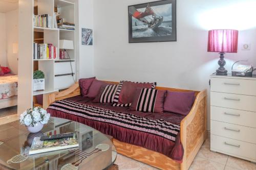 Χώρος καθιστικού στο Charmant studio meublé